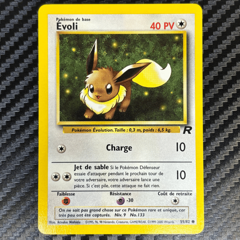 Évoli 55/82 - Team Rocket - NM