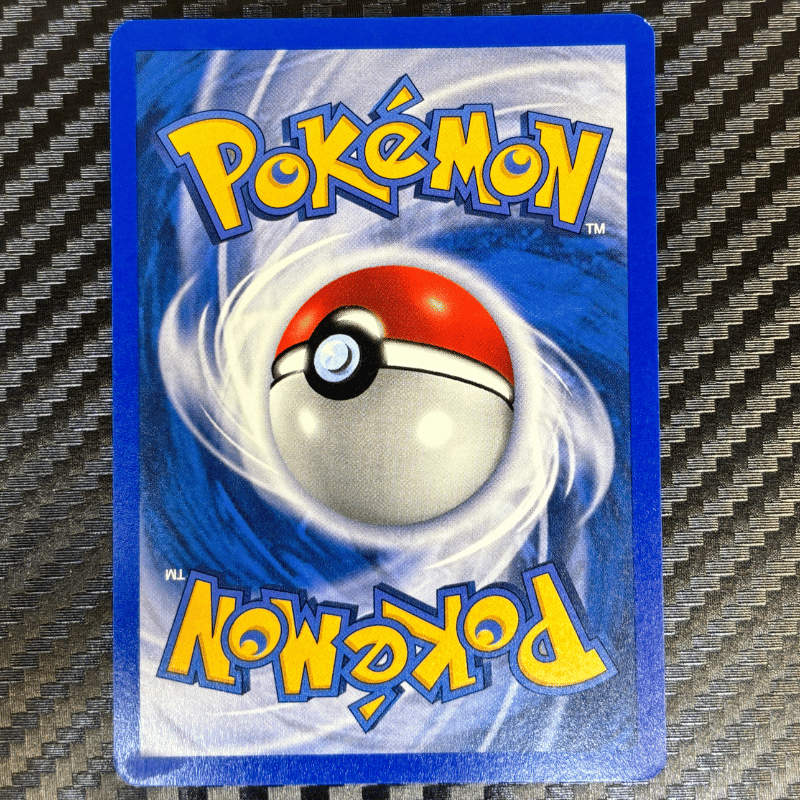 Tadmorv 57/82 - Team Rocket - NM